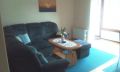 Appartment 5 - Sofa im Wohnzimmer.jpg